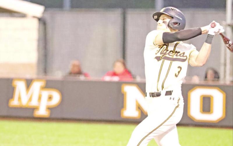 Braden Duff knocks in some runs for the Tigers. PHOTOS BY JOHN WHITTEN