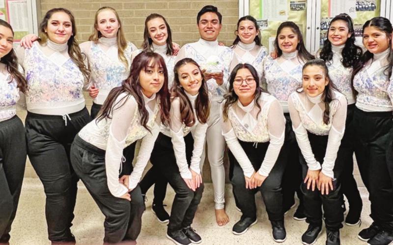 Pictured are the members of the MPHS Varsity Winterguard team. Front Row (L to R): Rosario Bello, Yasenia Paloblanco, Airam Antolín, Karime Leija. Back Row (L to R): Betzaida Garcia, Estefanie Torres, Addison Heeren, Jillian Jetton, Jonathan Tepetate, Katherine Phelan, Jocelyn Marroquín, Abigail Retana, Lolita Solís, Kaira Leija COURTESY PHOTO