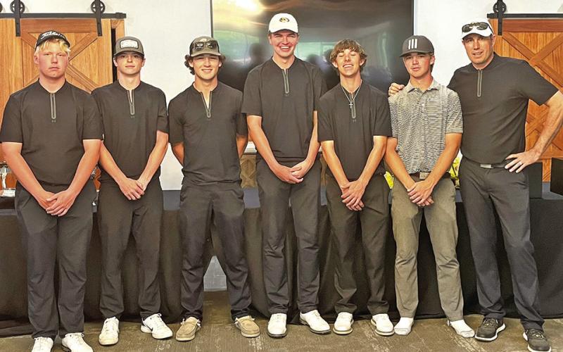 Tiger Golf (L to R) Jacob Baker, Owen Green, Kade Strickland, Clayton Brison, Braiden Merryman, Matthew Peterson, and Coach Benny Blaser COURTESY PHOTO