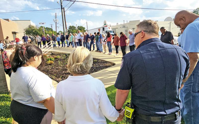 Dozens join hands at Mount Pleasant City Hall on Prayer Day