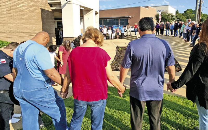 Dozens join hands at Mount Pleasant City Hall on Prayer Day
