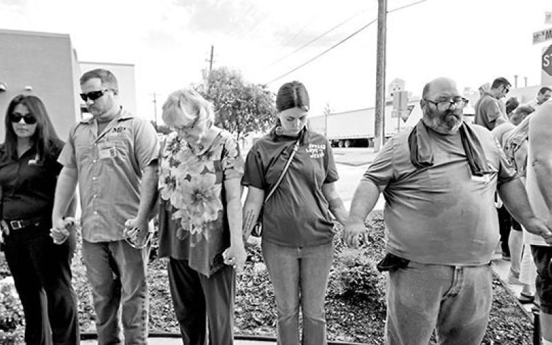 Dozens join hands at Mount Pleasant City Hall on Prayer Day