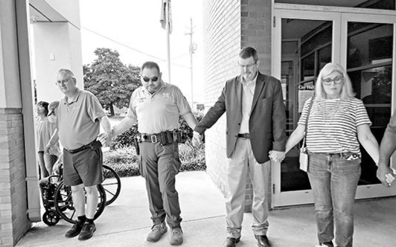 Dozens join hands at Mount Pleasant City Hall on Prayer Day