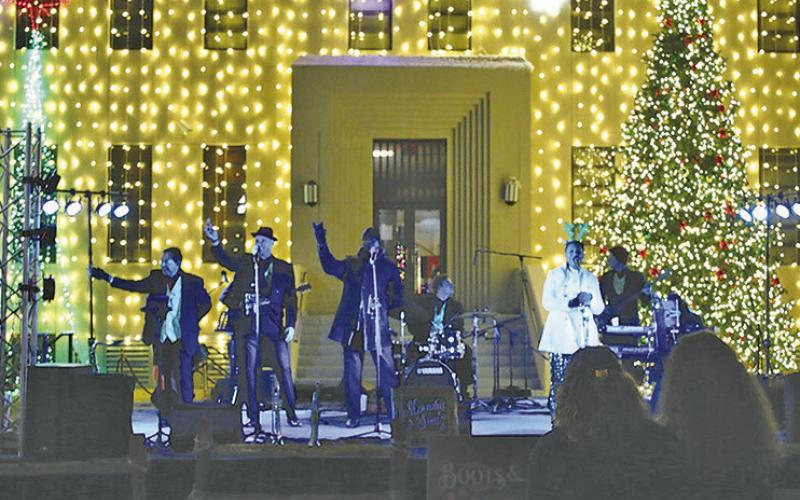Memphis Soul entertains the crowd Thursday night with a backdrop of a million lights.