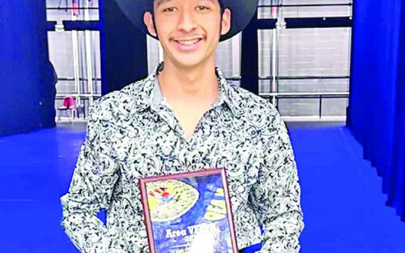 Christo Escalante with his Area VI 1st place Talent award COURTESY PHOTOS