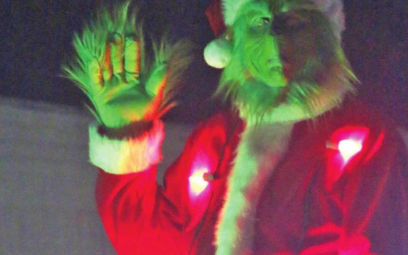 Many grinches were seen at the storybook-themed Christmas parade.
