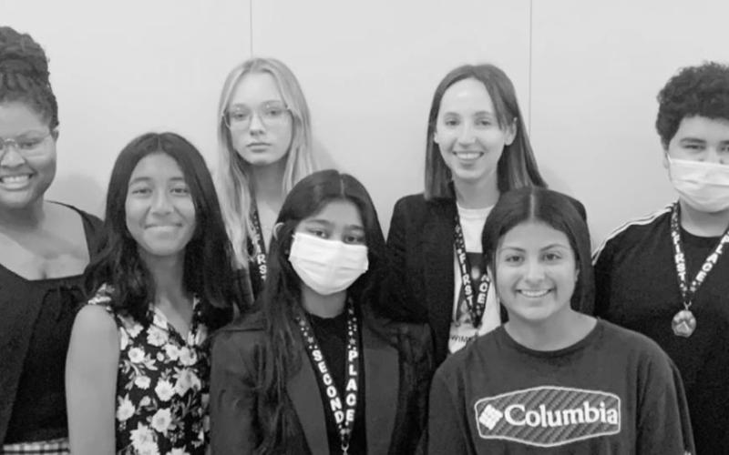 Front row L to R: Monserrat Lopez, Gopi Amin, Merlin Cardona, Back row L to R: Coach Enrique Martinez, Kiara Rundles, Taylor Hubbs, Connelly Cowan, Anthony Orellana, Madeline Tumey-Simmons COURTESY PHOTO