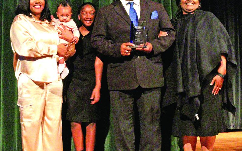 Dr. Tony Rundles receives the Citizen of the Year award.