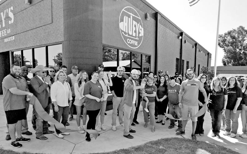 On September 13, the red ribbon is cut for the official opening for Huey’s Coffee in Mt. Pleasant TRIBUNE PHOTO / NICOLE KIMBALL