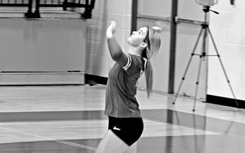 Makenzie Bottoms serves during Pewitt’s match against Clarksville Tuesday. The Lady Brahmas opened district play Friday at Atlanta. TRIBUNE PHOTO / QUINTEN BOYD