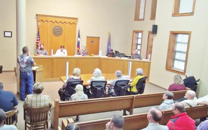 Sugar Hill VFD Chief John Grubbs speaks to commissioners about obstacles the department is facing. COURTESY PHOTO