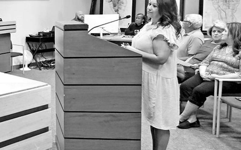 Claribel Banda talks about a logo redesign for Main Street TRIBUNE PHOTOS / NICOLE KIMBALL