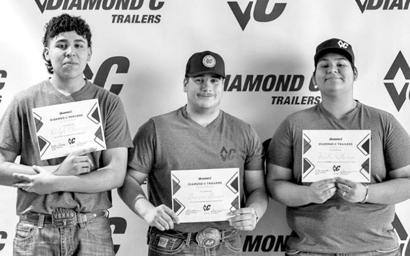 Mount Pleasant seniors Ralph Chavez, Brazos Brown and Victor Olvera graduated from Diamond C Trailers’ Next Generation Welder program recently. The trio worked along experienced welders and department heads and gained hands-on experience and completed a trailer from scratch. COURTESY PHOTO