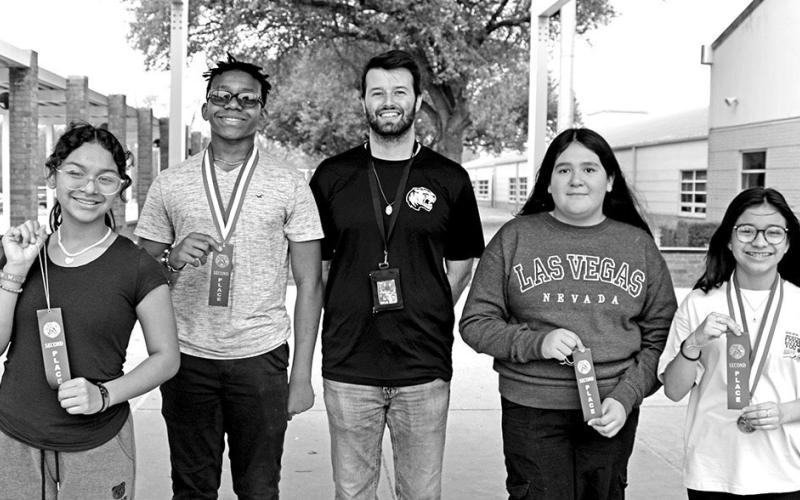 Spelling (L to R) Yoselin Nava, Drayson McDaniel, Coach Joshua Dykes, Berenice Murillo, Valerie Hipolito