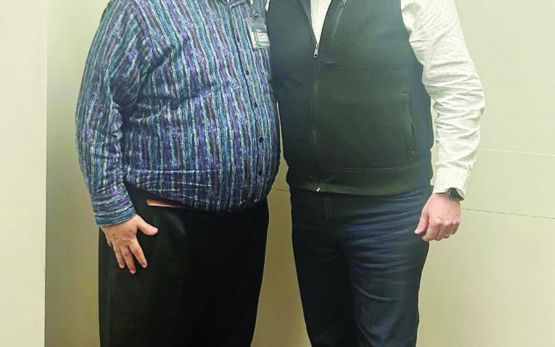CEO Terry Scoggin and Trinity Senior Pastor Chris Wigley COURTESY PHOTO