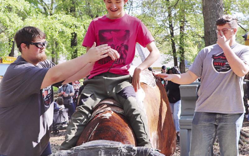 Leo Sambueso takes a turn on the mechanical bull COURTESY PHOTOS