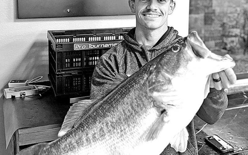 Riley Harris of Orange was running some offshore waypoints on November 22 at Sam Rayburn when this 13.79 pounder gobbled up his football jig around a brush pile in about 22 feet of water. It’s the biggest fall bass reported from Sam Rayburn in nearly a decade. (Photo courtesy Tackle Addict)