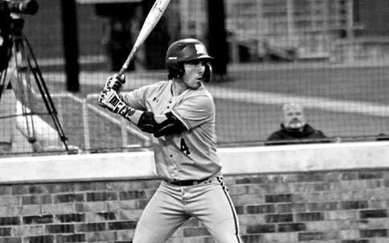 Tiger slugger Drew Cross (4) stands ready in the box to hit on Monday night. Cross went 2-for-2 with an RBI in the victory over Texas High.