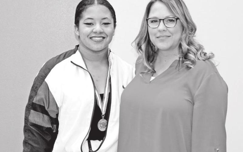 Poetry Regional Qualifier Madeline Tumey-Simmons with coach Angela Priefert COURTESY PHOTO