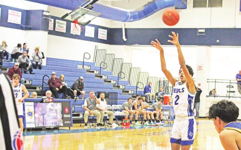 Tre Williams and the Rivercrest Rebels will hope to win a second consecutive district championship next basketball season. Joining the Rebels and Harts Bluff in the new District 16-2A for basketball will be Maud, Clarksville, James Bowie and Detroit. TRIBUNE PHOTOS / QUINTEN BOYD