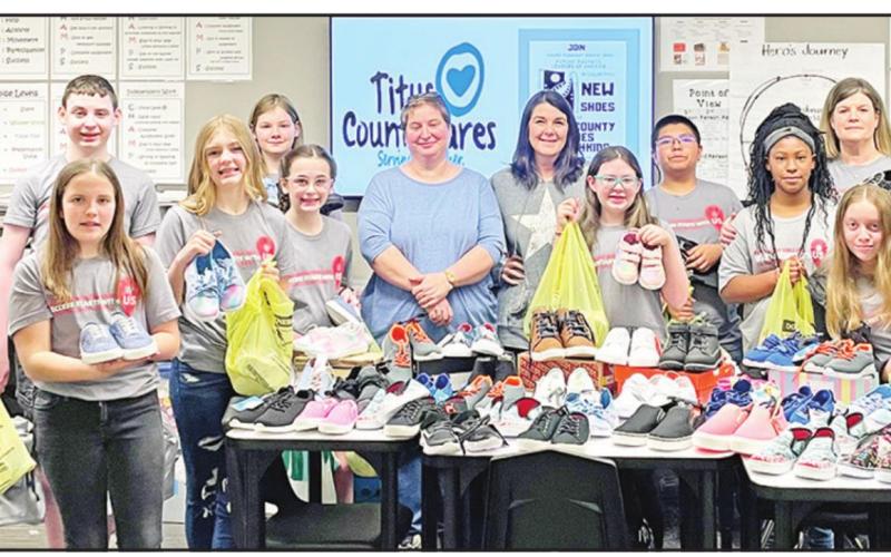 MPISD FBLA Middle Level members present new shoes to Cares4Kids Directors Kim Haddox and Kim Hedges. COURTESY PHOTO