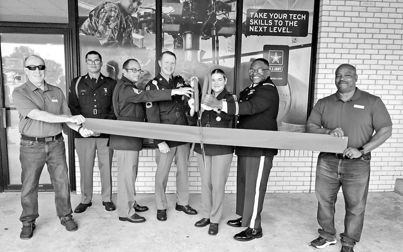 The MP Army Office joined the Chamber of Commerce with a ribbon cutting