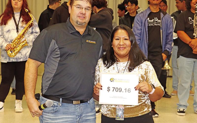 Brice teacher, Lorena Alvarado, receives a grant for a Mimio teach wireless interactive system and stylus from Foundation Vice President for Finance/Governance, Brad Lowry