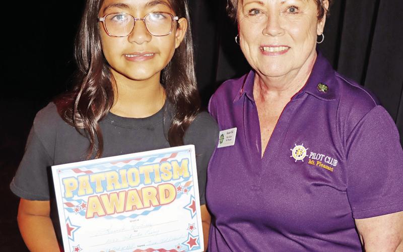 Wallace Middle School sixth-grader, Hannah Martinez, recently won the annual Pilot Club essay contest. She has been awarded a certificate, a $75 prize, and will be a guest at a future Pilot Club meeting to read her award-winning essay. Pictured are Hannah Martinez (left) and Pilot Club member Susan Old (right) COURTESY PHOTO
