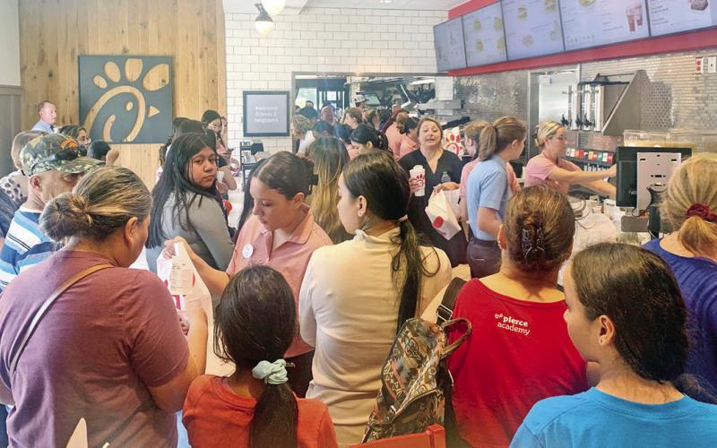 The community turned out hoping to get their first taste of the food at Mount Pleasant’s Chick-Fil-A location Thursday during the grand opening. TRIBUNE PHOTO / QUINTEN BOYD