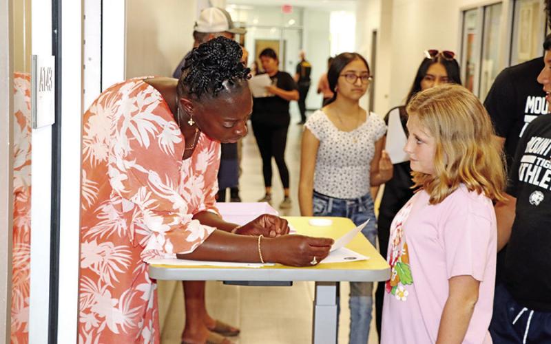 MPHS teacher, Shanta Lockett, looked over a new freshman’s schedule