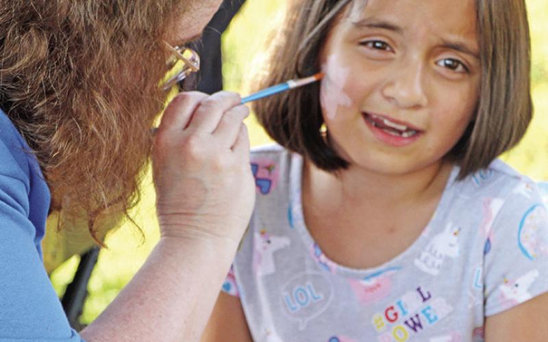 Wallace teacher Tara Flores provided face painting