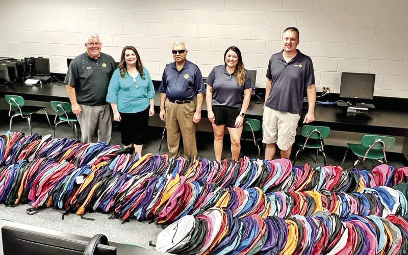 Hundreds of backpacks were given away Thursday evening during the backpack giveaway held at Mount Pleasant Junior High. The event, sponsored by Pilgrim’s and local realtor Amy Hinton, offered an opportunity to receive backpacks — and some other supplies — just in time for the school year. COURTESY PHOTOS