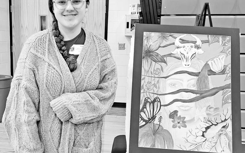 State qualifier Valerie Moss with her piece, Into the Woods