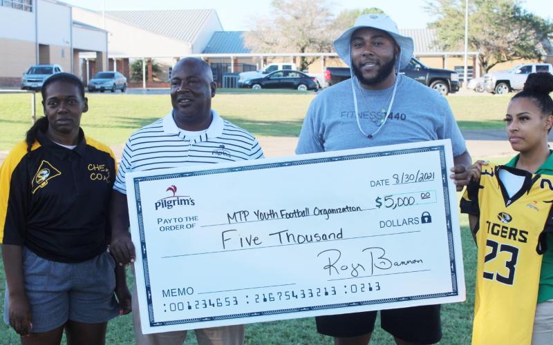 Pilgrim donates to youth football