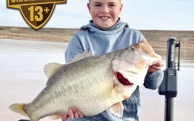 Stetson Davis, 11, displays the 13.31 Legacy Class Toyota ShareLunker he caught on March 6 at Lake J.B. Thomas. The fish is a Junior Angler Water Body record for the 7,600-acre reservoir near Snyder. (Photo courtesy Brodey Davis)