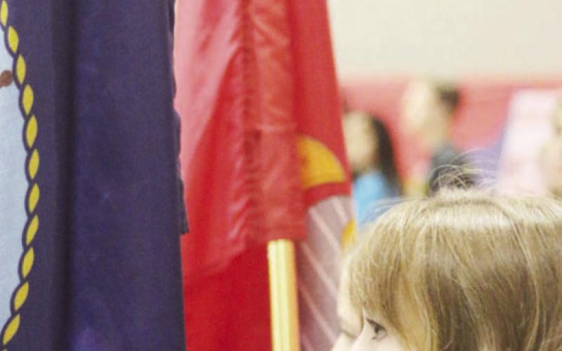 A student participates in MPISD’s Veterans Day program in 2021. FILE PHOTO