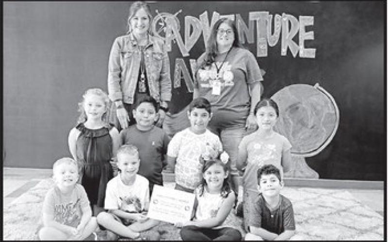 Annie Sims Sweepstakes (L to R): 1st Row Lincoln Litke, Liam Litke, Clara Barnard, Adrian Mayorga. 2nd Row Evelyn Buchanan, Damian Moreno, Diego Mayorga Lopez, Esther Robles Back: Sims Principal Jeannie Pat Jaggers and Academic Rodeo Chair Tonya Mullins.