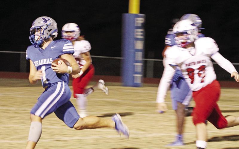 Pewitt’s Hayden Green glides into the end zone during Thursday’s game against Prairiland. The Brahmas’ 16-point win over the Patriots means that Pewitt will claim a playoff spot if they beat Chisum and Redwater loses to DeKalb next week. TRIBUNE PHOTO / QUINTEN BOYD