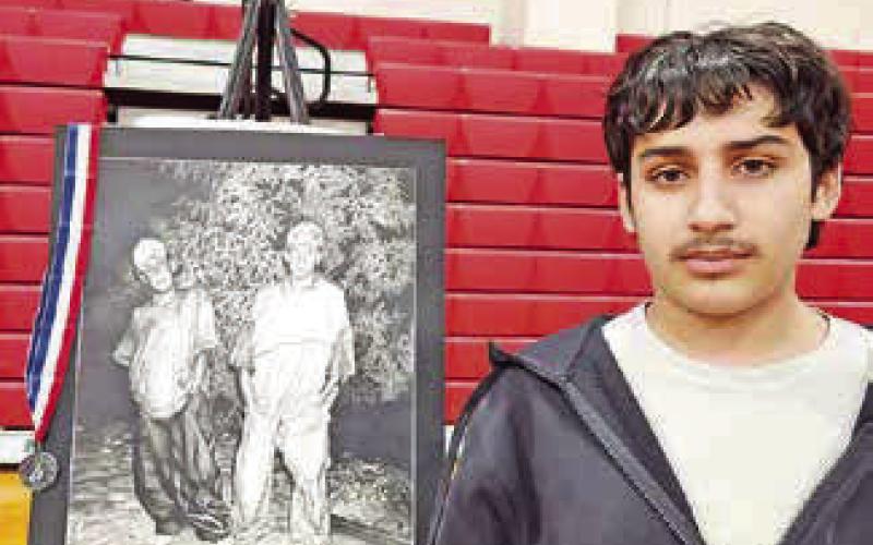 State qualifier Josue Vega with his piece, The Boys