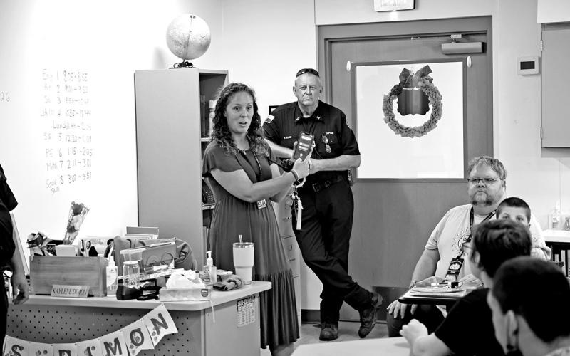 MPHS Assistant Principal, Kristy Ciuba, demonstrates how to dial 9-1-1 Courtesy Photos