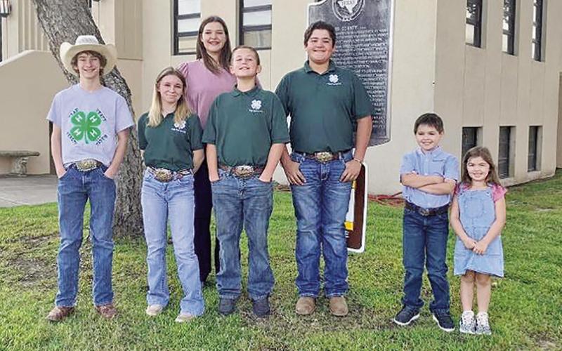 Titus County 4-H Members spoke to the Titus County Judge and Commissioners during Commissioner’s Court about the 4-H Program to help celebrate National 4-H Week. From left are Trevor Gibson, Keelie Gibson, Karlee Rodgers, Case Rodgers, Presley Russell and Joleigh Russell. COURTESY PHOTO / CALLIE ZOELLER