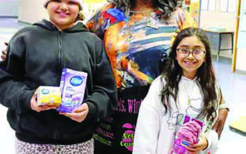 Fowler NEHS members Maryna Bean (left) and Lindsay Gonzalez (right) with Advisor Debra Williamson (center) COURTESY PHOTO