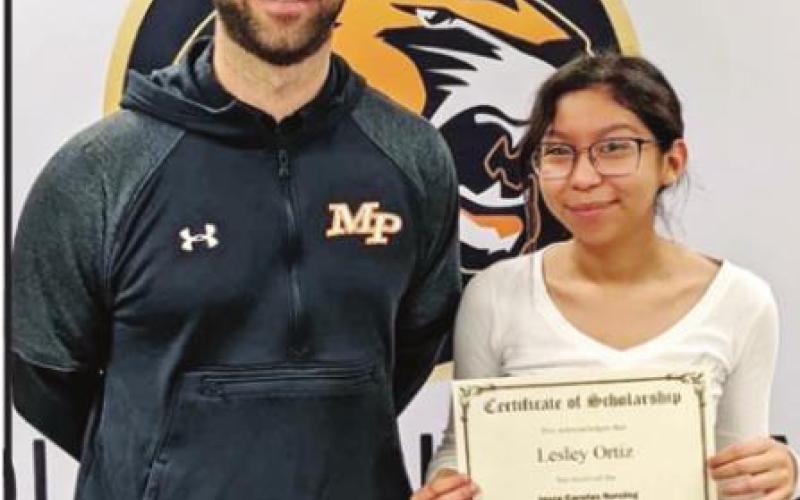 MP Cross Country runners receive scholarships