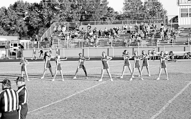 The Rivercrest Junior High cheerleaders perform during Thursday’s game against Cooper. Members are seventh graders Adriana Jones, Olivia Damron and Jaylie Cabell and eighth graders Taylor Smith, Anna Jean, Jade Harville, Kensley Crawford, Libby Cheatwood and Audrey Alford. TRIBUNE PHOTO / QUINTEN BOYD