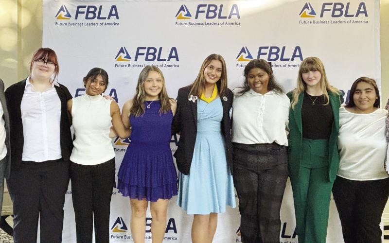 MPHS FBLA Advisors and Officers (L to R) Advisor John Whitten, Reporter Harley Martin, Vice President Gopi Amin, Reporter Kate Ball, Co-President Sophie Greco, Senior Representative Kiara Rundles, Treasurer Hope Powell, Parliamentarian Xitlaly Sanchez, Advisor Shanta Lockett. COURTESY PHOTO