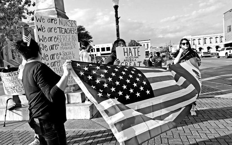 Anti-ICE peaceful protesters gather in downtown Mount Pleasant