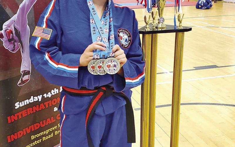 Jadyn Bragg holds her trophy proudly