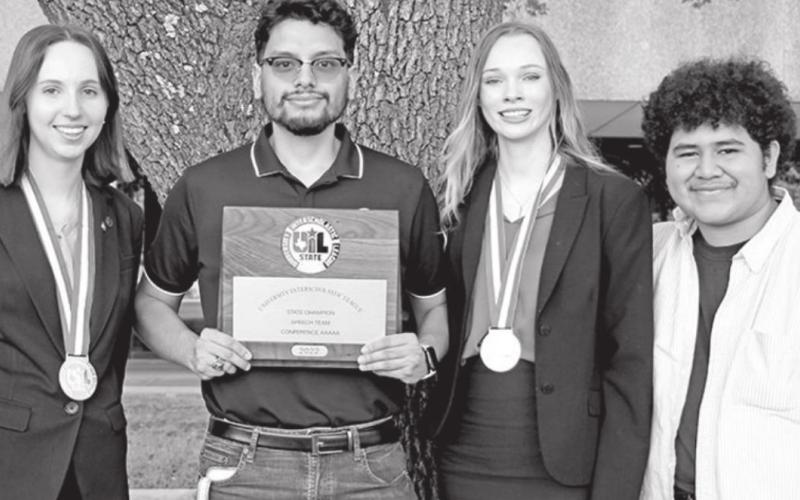 MPHS State Champion Speech team members (L to R) Connelly Cowan, Coach Enrique Martinez, Taylor Hubbs, and Anthony Orellana COURTESY PHOTO