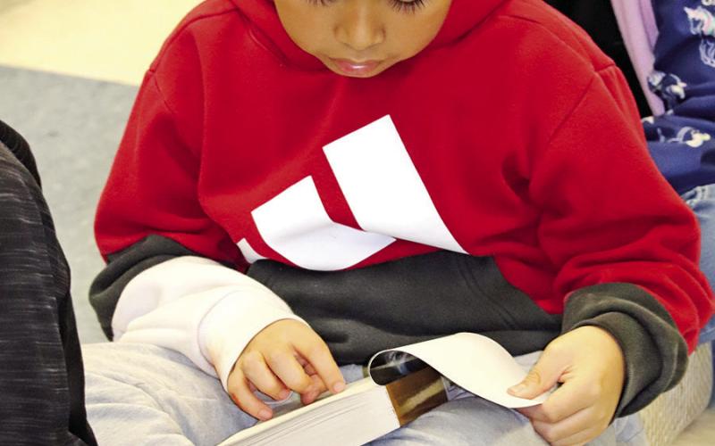 Fowler 3rd grader Camilo Gomez searches for the correct answer