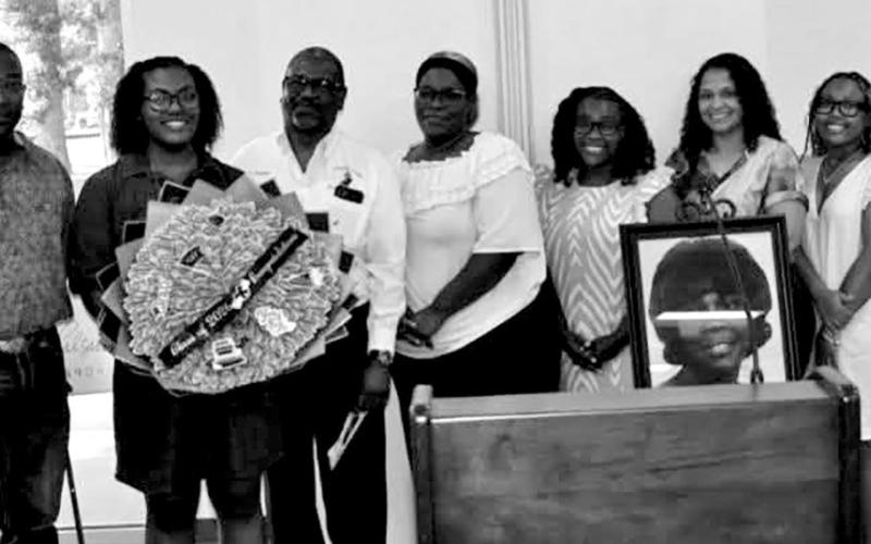 The Exceptional Essay Winner Ja’Liyah Hall. Pictured from left to right: Billie Wells (Pilgrim’s Community Liaison), Ja’Liyah Hall (recipient) Dwight Payne, Gaylon Payne, Hanaiya Payne-Johnson, Jasmine Brannon, Mekhilyn Payne-Johnson and Ayana Payne